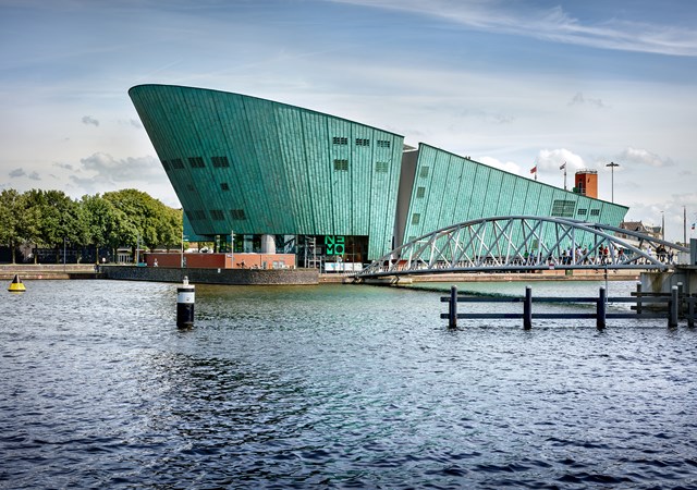 The exterior of the Amsterdam Museum of Contemporary Art, featuring contemporary design and artistic elements.